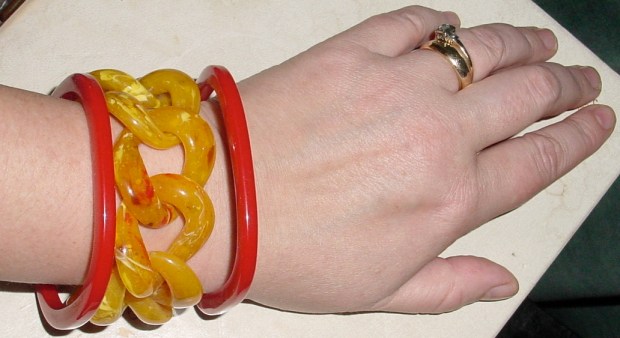 Three plastic bracelets