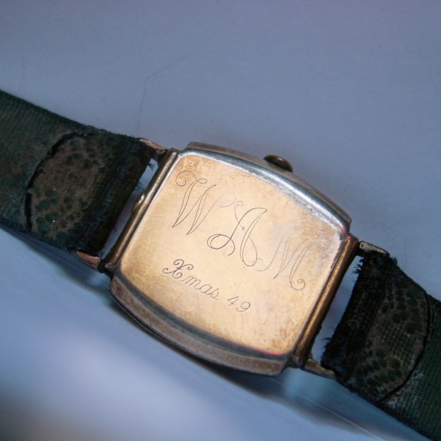 Presentation watch with engraved case