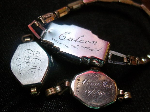 Three engraved and monogrammed watch cases