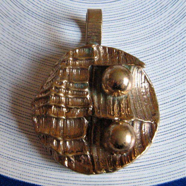 made in finland bronze pendant